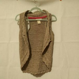 Adorable cardigan. Non used. Size: M (10-12)